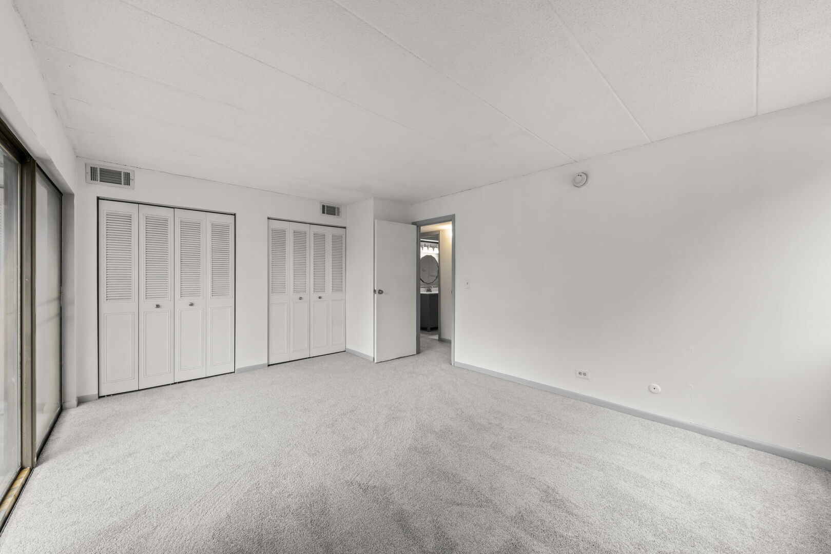 548 Timber Ridge Drive, Unit 108 Carol Stream, IL 60188 - Photo 9 of 18 a view of an empty room