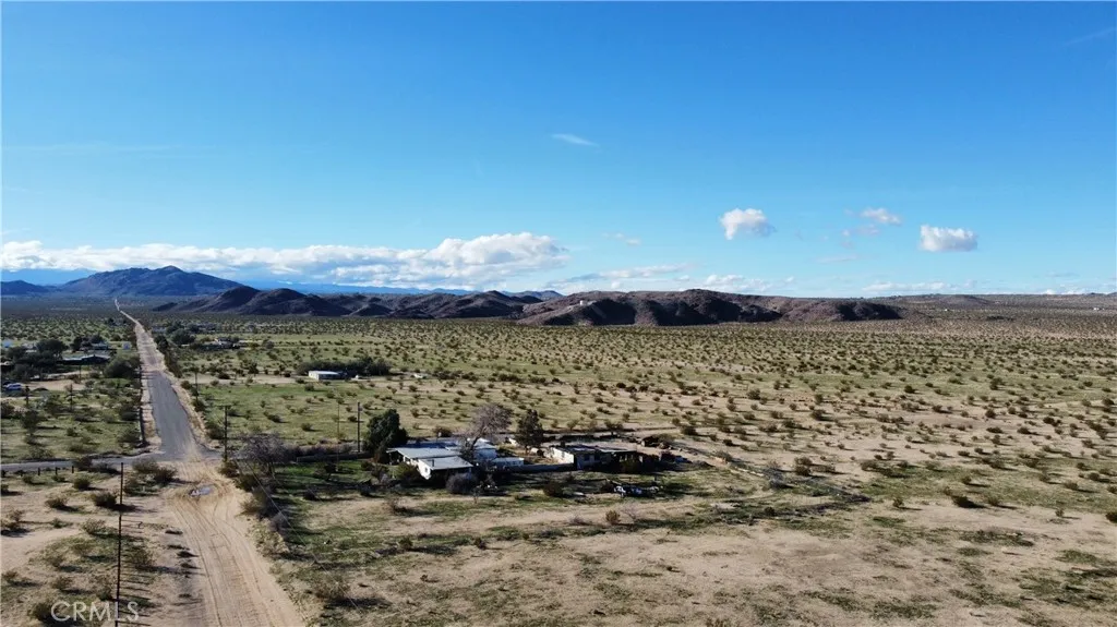 3 Sunflower Yucca Valley, CA 92252 - Photo 3 of 16 a view of a lake with mountains in the background