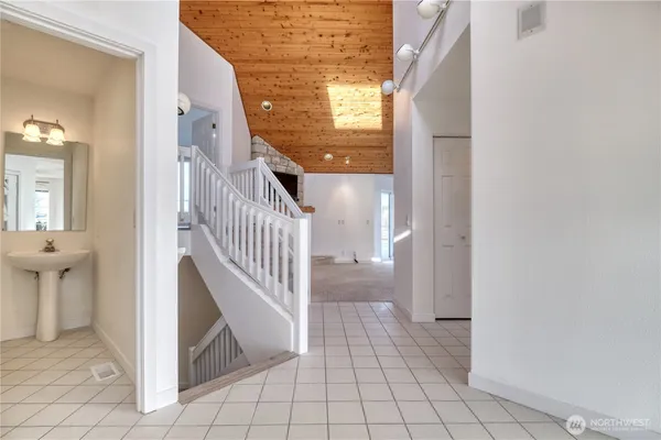 a view of empty room with fireplace