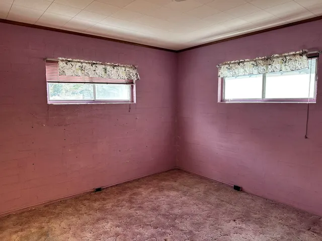 an empty room with a window