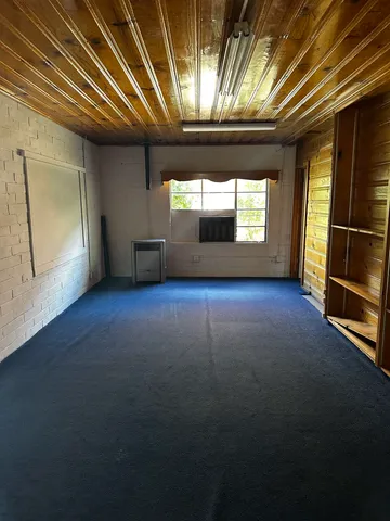 a view of empty room with windows