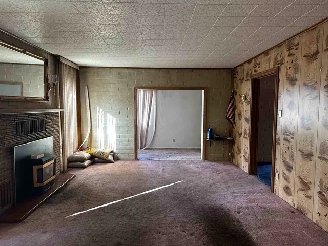 a view of a livingroom with a fireplace