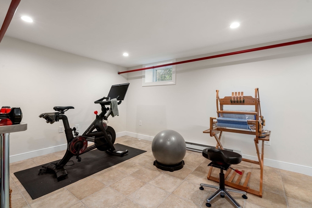 18 Moulton Road, Unit 1 Arlington, MA 02476 - Photo 11 of 16 a view of a room with gym equipment