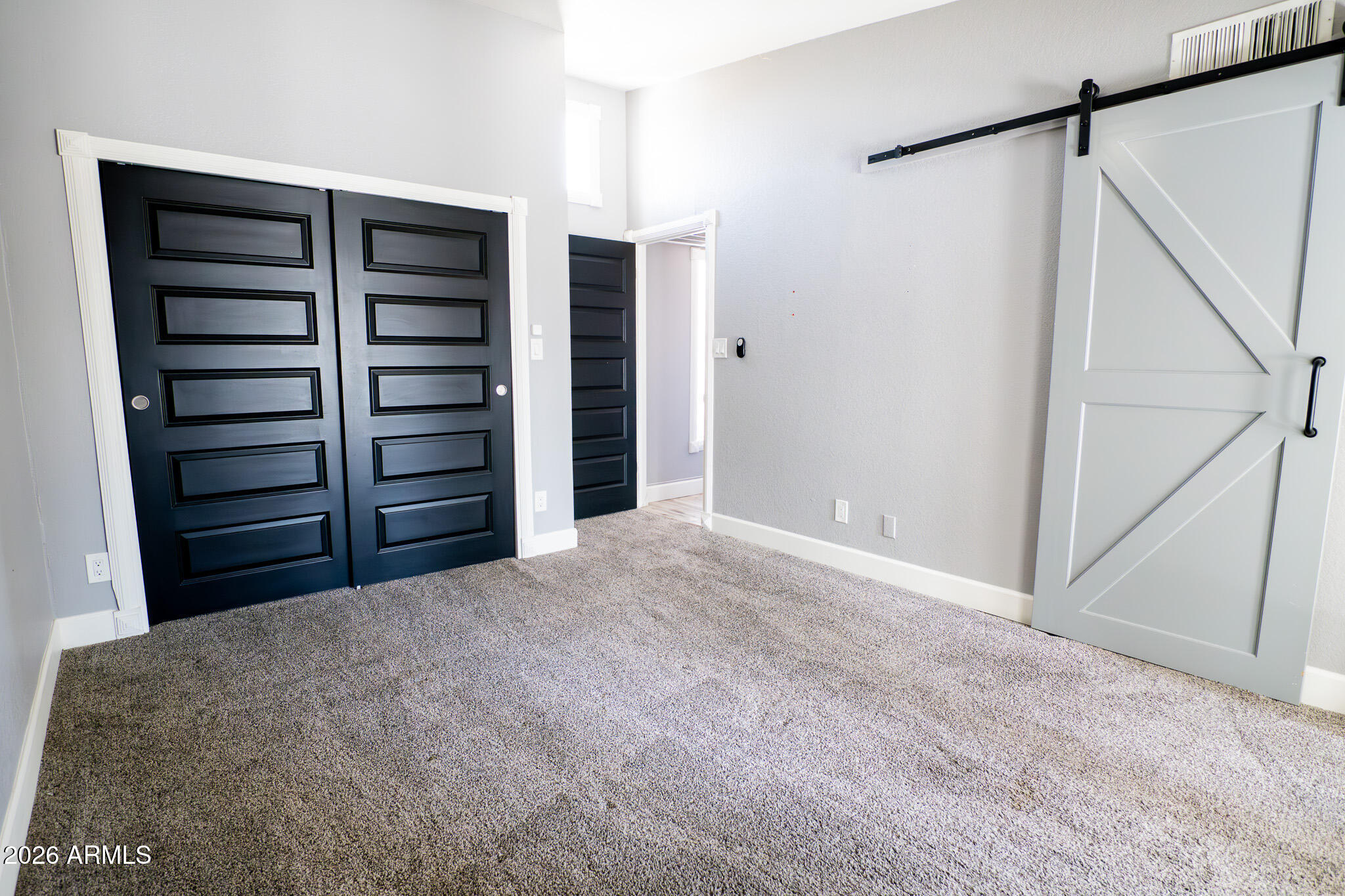 5100 North Miller Road, Unit 3 Scottsdale, AZ 85250 - Photo 18 of 31 a view of walk in closet with clothes