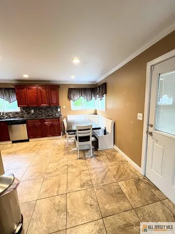 a room with furniture and a flat screen tv