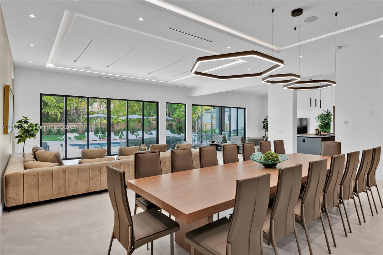 2110 Northeast 197th Terrace Miami, FL 33179 - Photo 12 of 77 a living room with furniture and a large window