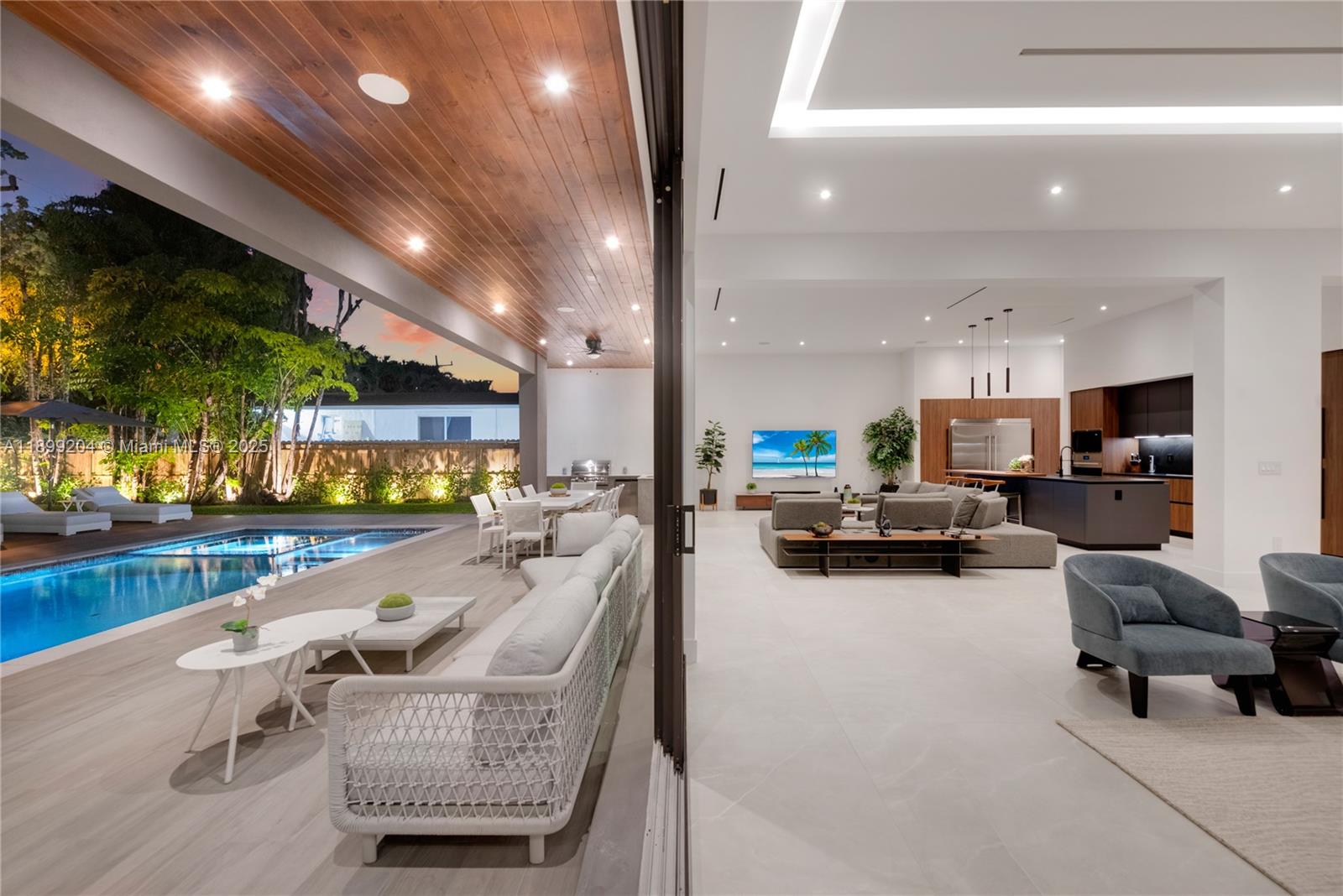 2110 Northeast 197th Terrace Miami, FL 33179 - Photo 14 of 77 a living room with furniture and a flat screen tv