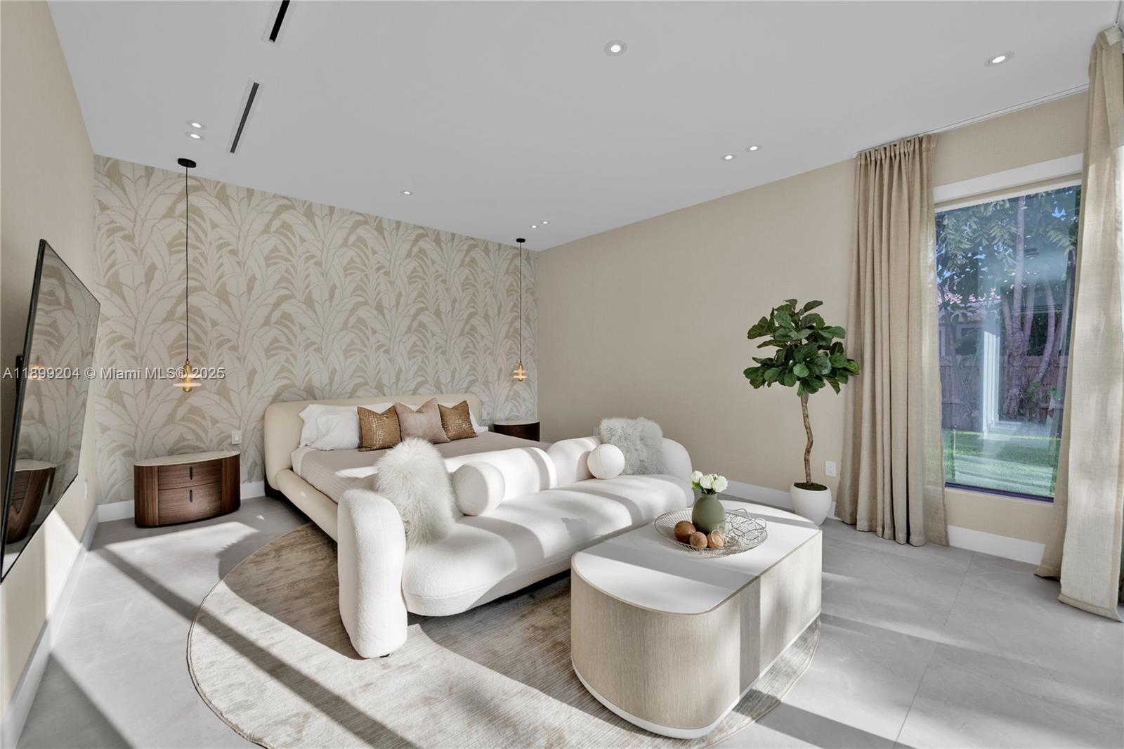 2110 Northeast 197th Terrace Miami, FL 33179 - Photo 29 of 77 a living room with furniture and a flat screen tv