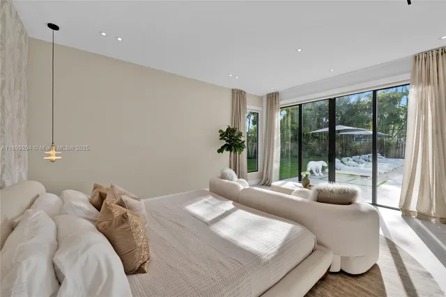 a bathroom with a sink mirror vanity and toilet