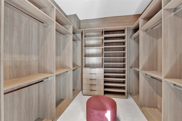 a bathroom with a sink a shower and a mirror