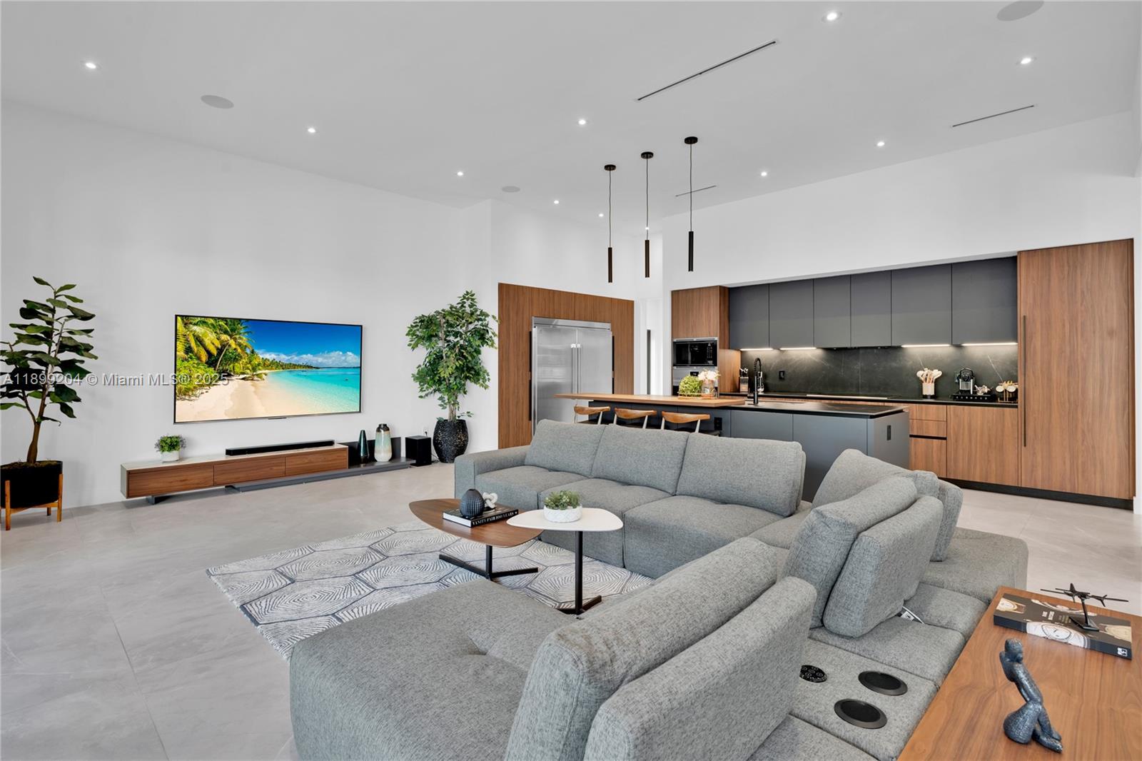 2110 Northeast 197th Terrace Miami, FL 33179 - Photo 6 of 77 a living room with furniture and a flat screen tv