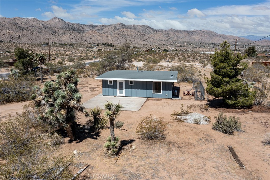 63350 Quail Springs Road Joshua Tree, CA 92252 - Photo 1 of 1 a view of house with a yard