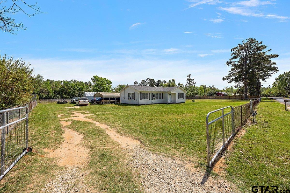 279 Fairview Street Rusk, TX 75785 - Photo 18 of 23 a view of a swimming pool with a yard