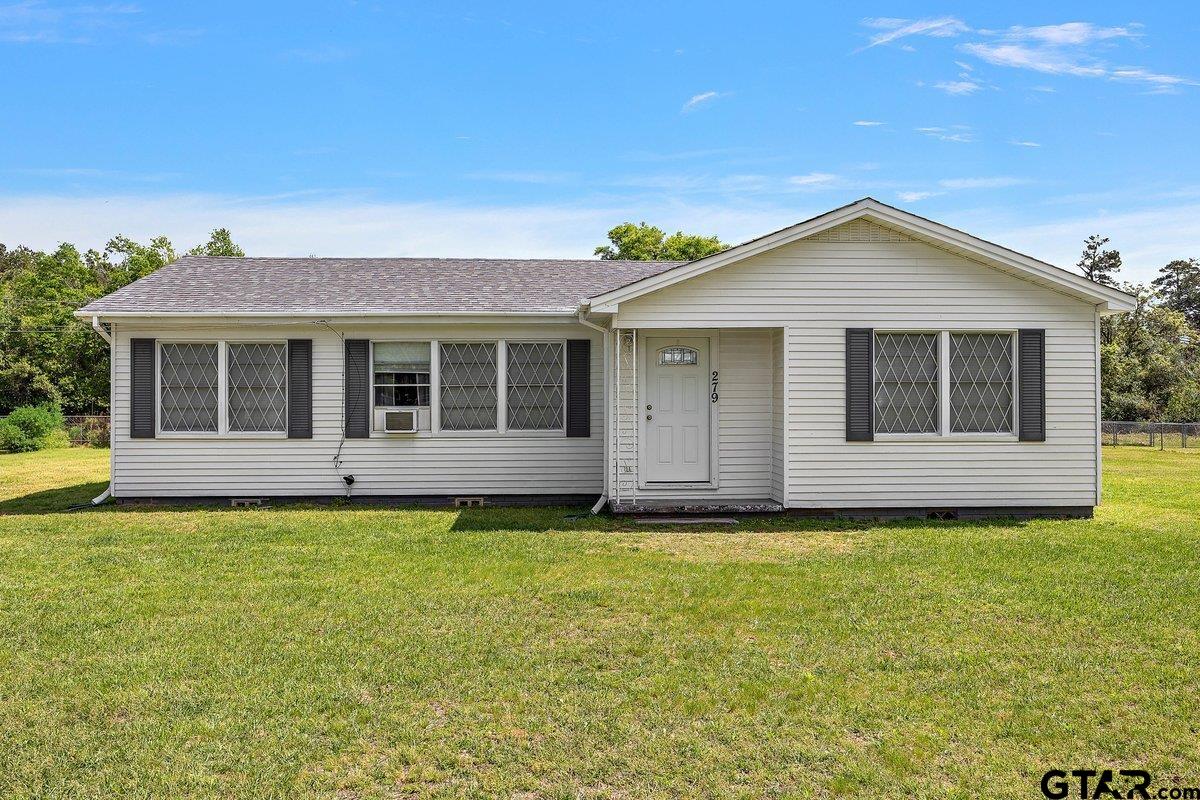 279 Fairview Street Rusk, TX 75785 - Photo 2 of 23 a view of a house with a yard