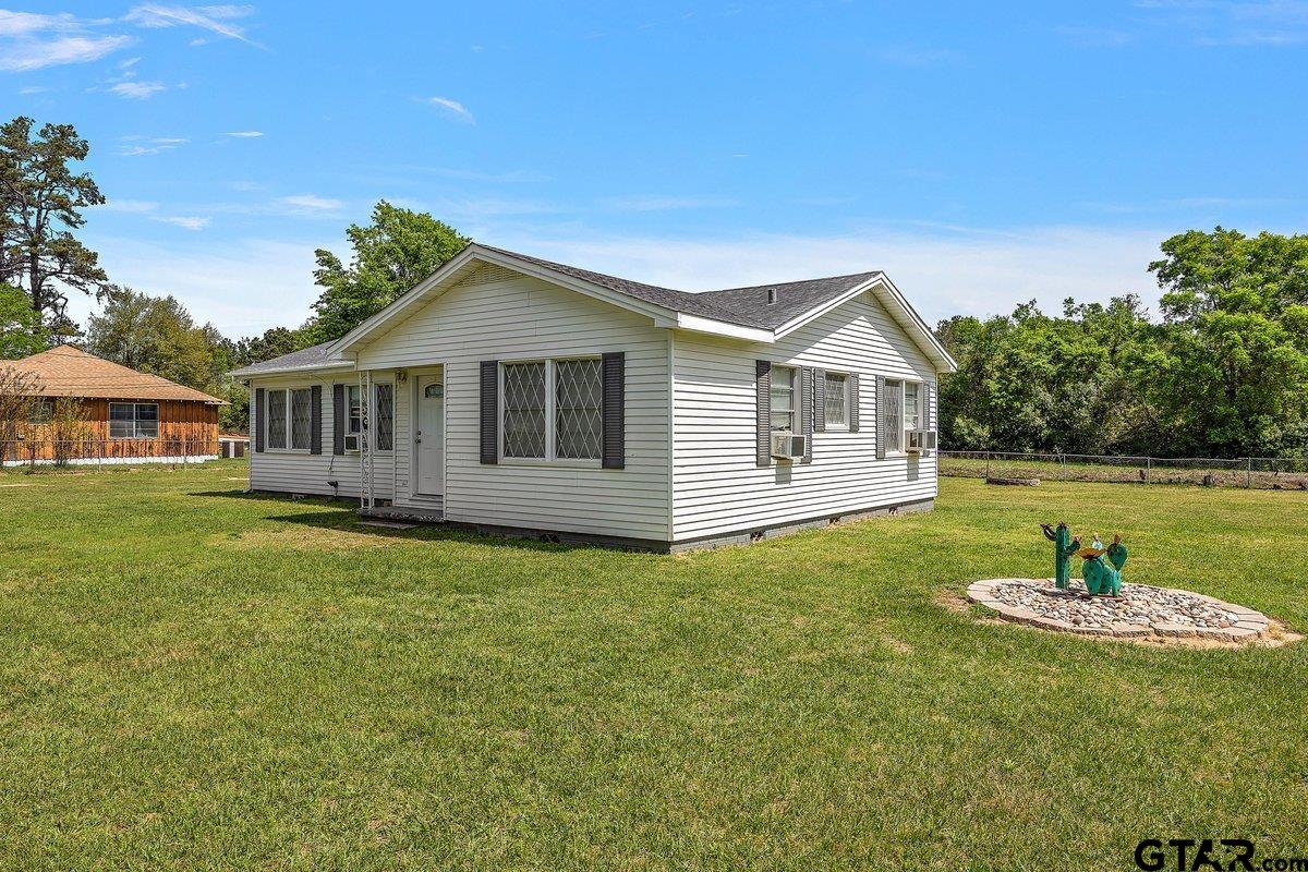 279 Fairview Street Rusk, TX 75785 - Photo 3 of 23 a front view of a house with a yard