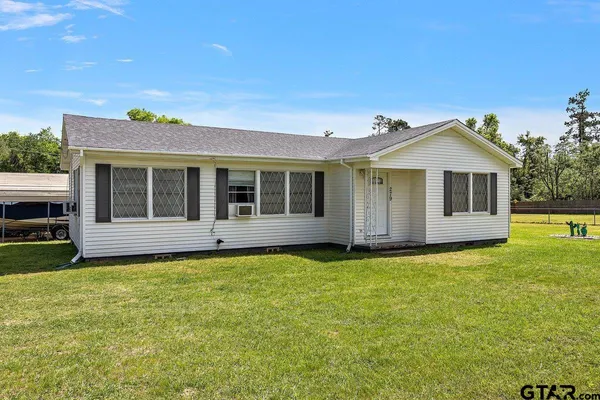 a view of a house with a garden