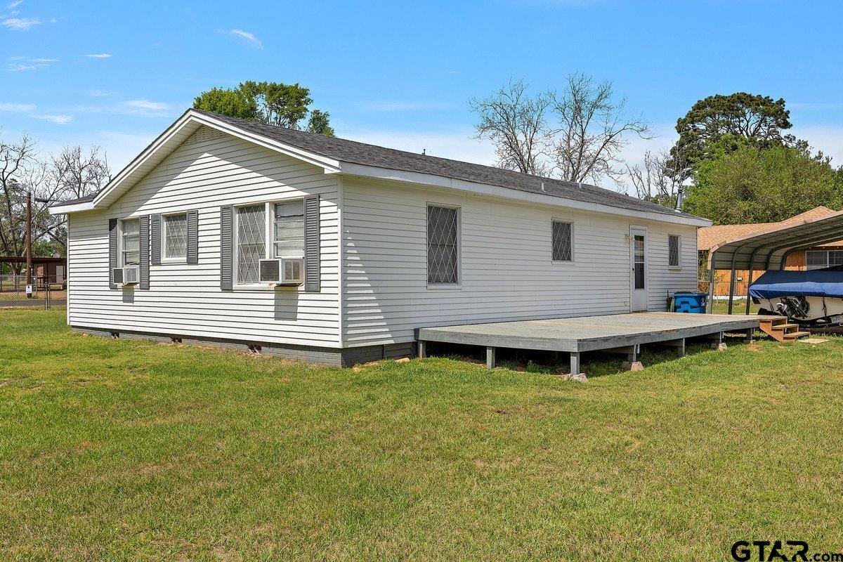 279 Fairview Street Rusk, TX 75785 - Photo 5 of 23 a front view of a house with a garden