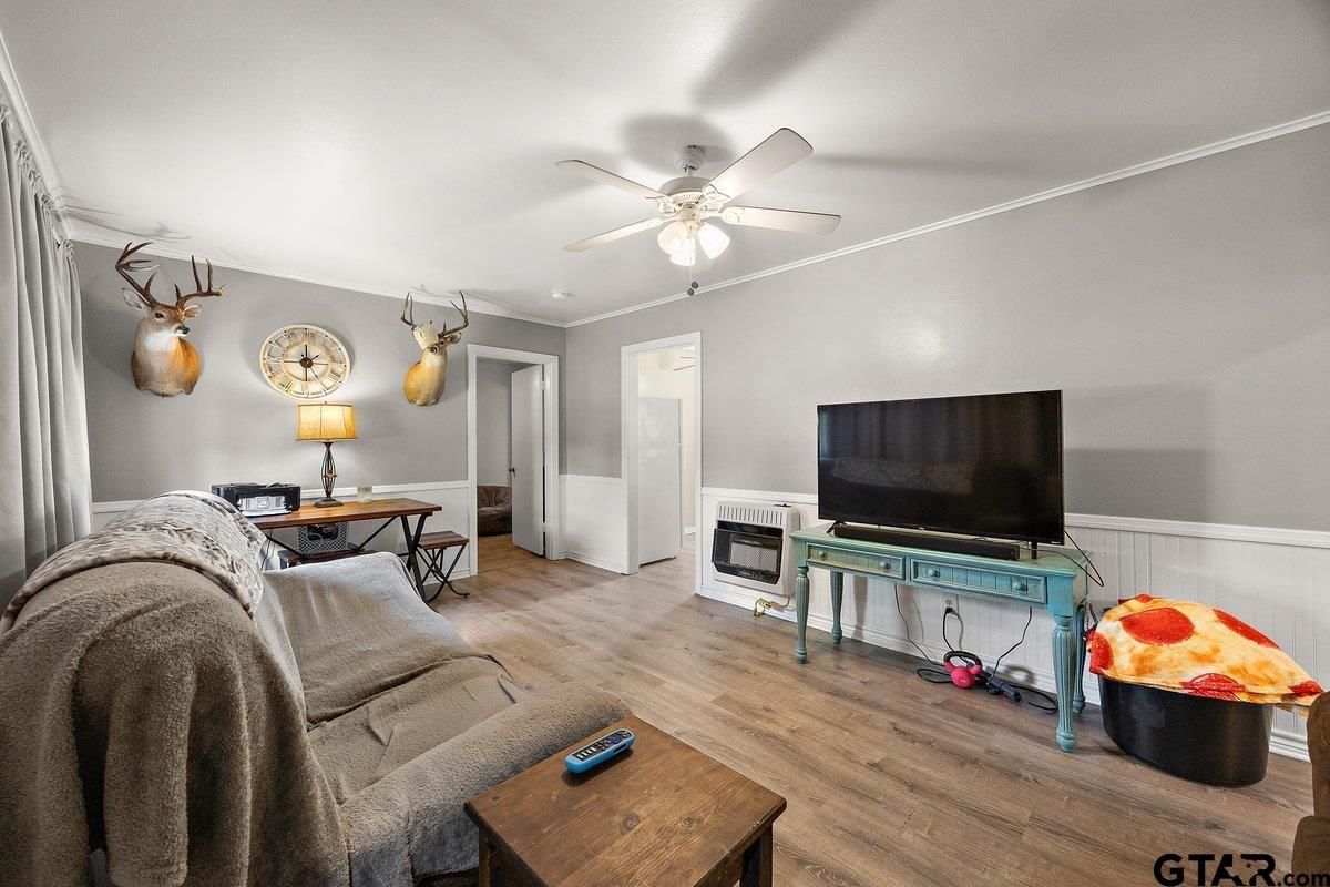 279 Fairview Street Rusk, TX 75785 - Photo 7 of 23 a living room with furniture and a flat screen tv
