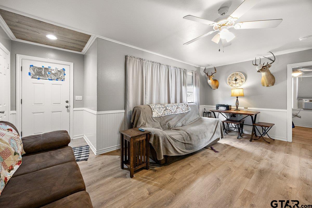 279 Fairview Street Rusk, TX 75785 - Photo 8 of 23 a living room with furniture and a wooden floor