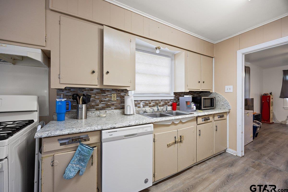 279 Fairview Street Rusk, TX 75785 - Photo 10 of 23 a kitchen with stainless steel appliances granite countertop a sink stove and cabinets
