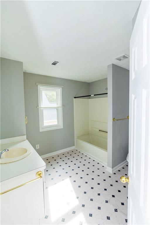 3440 Maple Valley Drive Cumming, GA 30040 - Photo 14 of 23 a bathroom with a sink toilet and shower