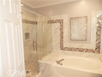 2 Los Palos Aliso Viejo, CA 92656 - Photo 17 of 32 a bathroom with a bathtub and a shower