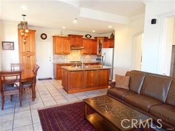 2 Los Palos Aliso Viejo, CA 92656 - Photo 7 of 32 a living room with furniture rug and a table