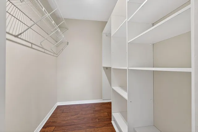 a view of entryway with wooden floor