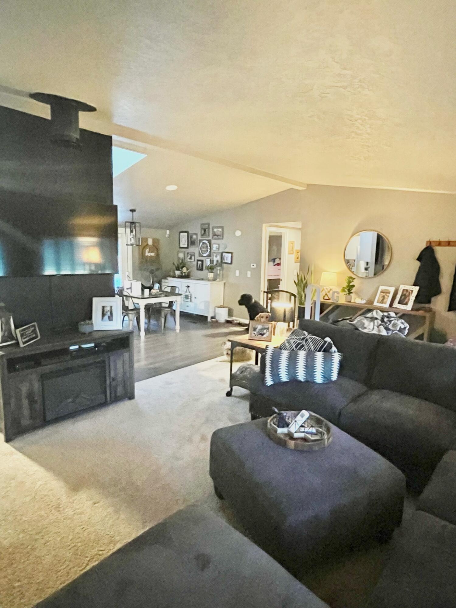 17317 Jacinto Road Bend, OR 97707 - Photo 5 of 25 a living room with furniture and a kitchen view