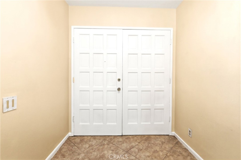 2145 Fairview Avenue Riverside, CA 92506 - Photo 7 of 35 a view of walk in closet with empty racks