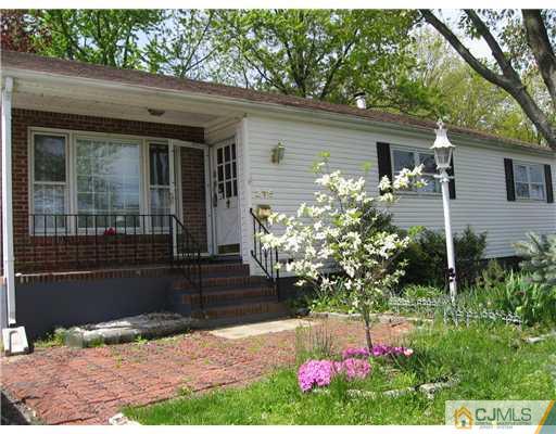 216 Cross Road Matawan, NJ 07747 - Photo 1 of 4 a front view of house with yard