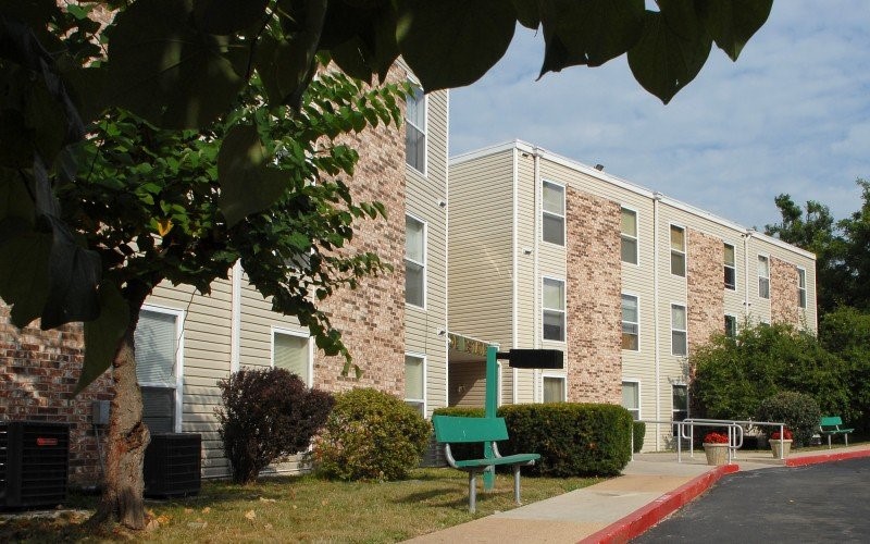 601 North Monroe Street Lebanon, MO 65536 - Photo 2 of 6 a backyard of a house with seating space