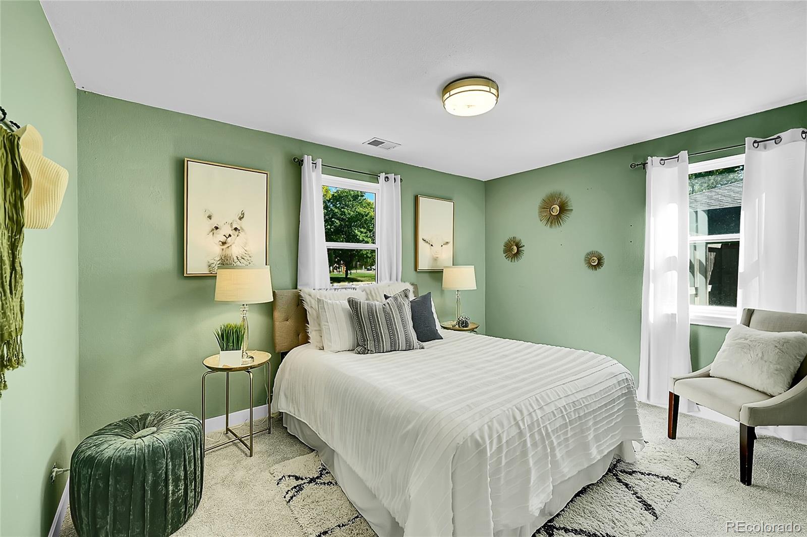 3011 Grape Street Denver, CO 80207 - Photo 14 of 42 a bedroom with a bed and window