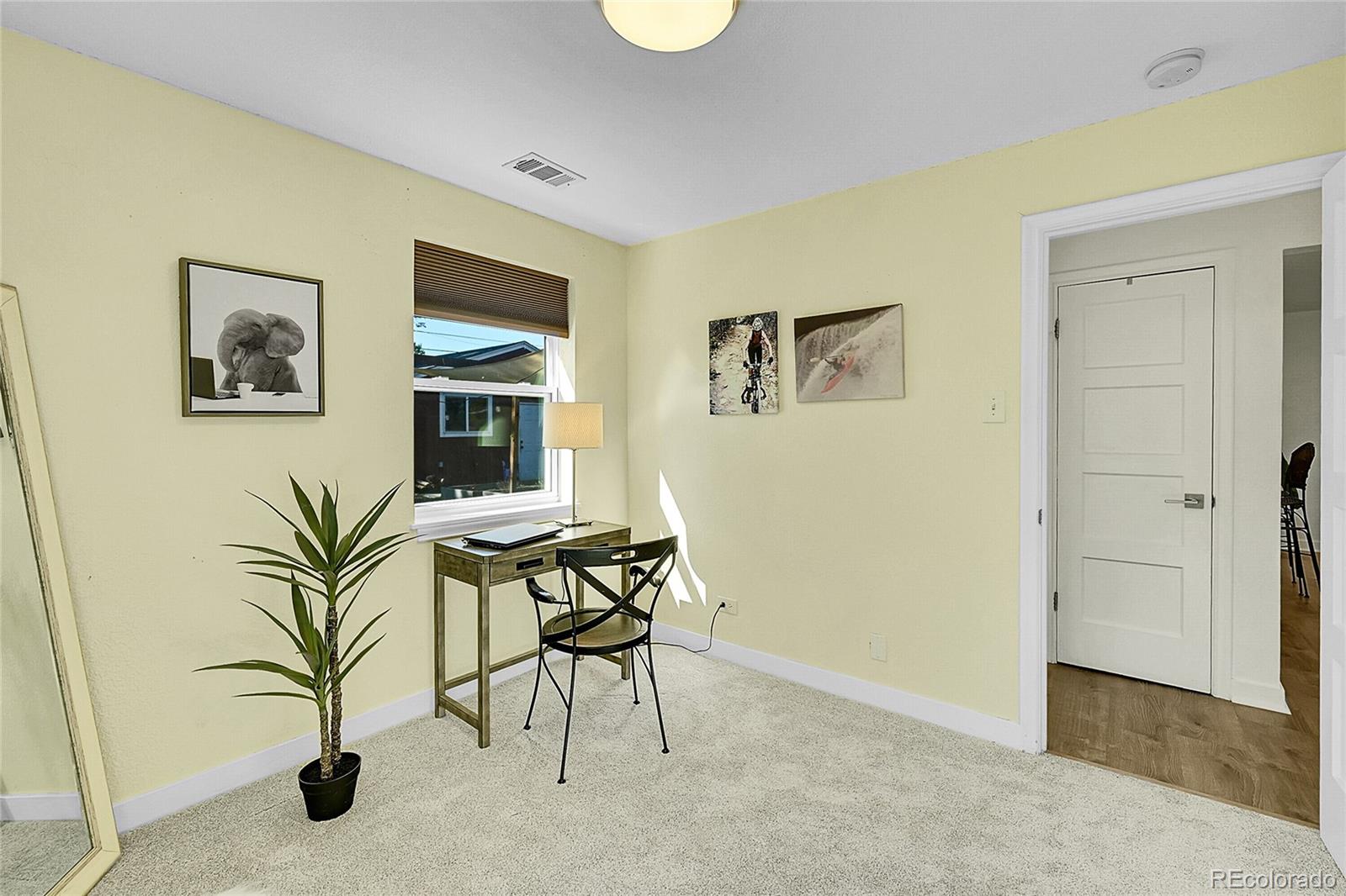 3011 Grape Street Denver, CO 80207 - Photo 20 of 42 a view of a livingroom with furniture and window