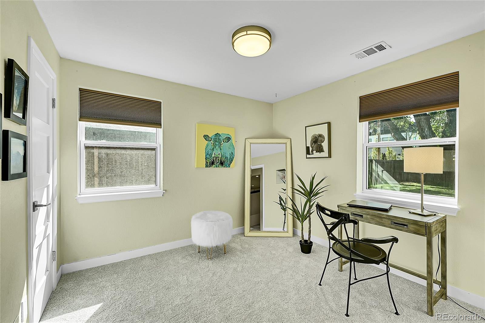 3011 Grape Street Denver, CO 80207 - Photo 21 of 42 a view of a livingroom with furniture and window