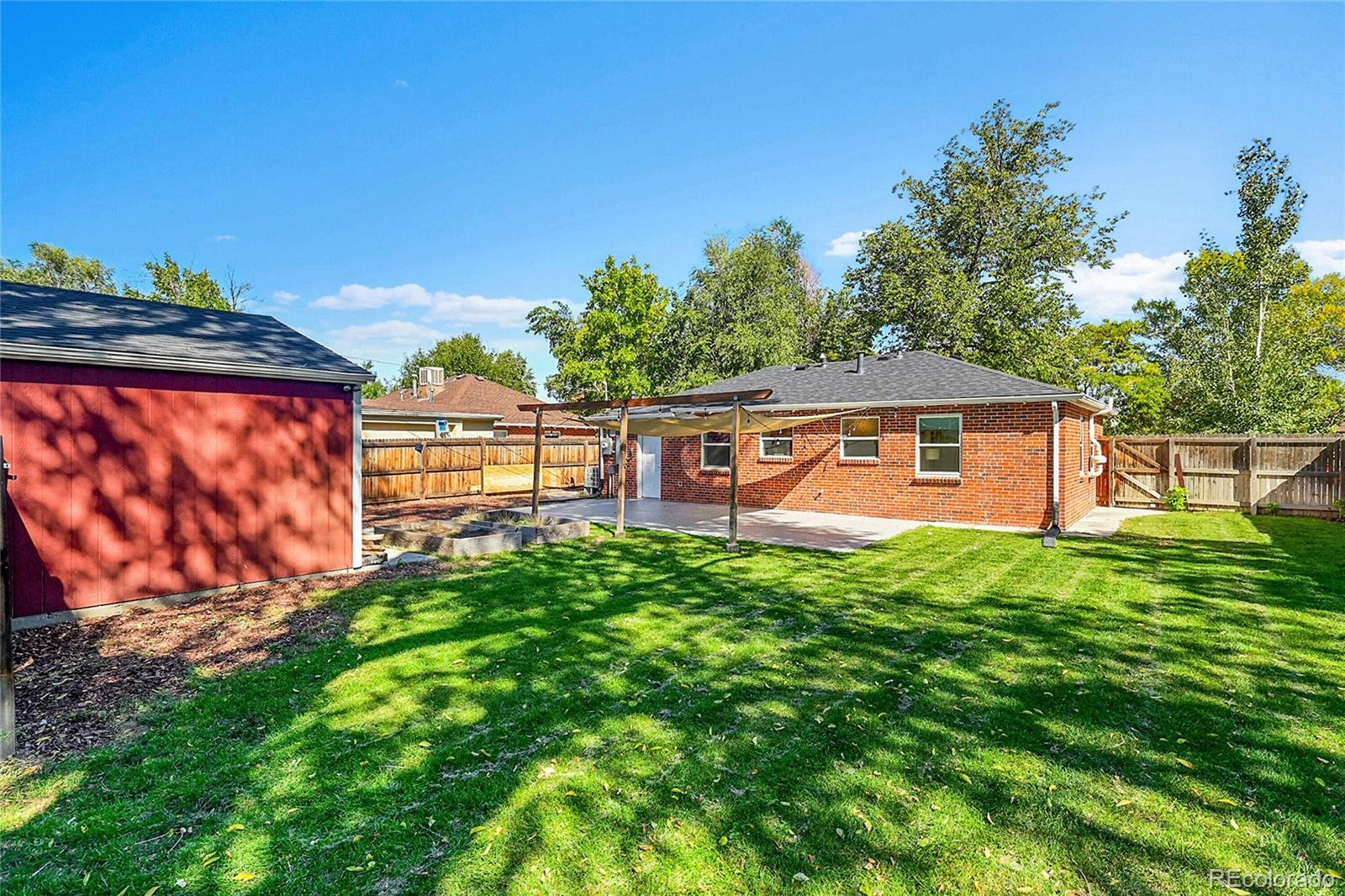 3011 Grape Street Denver, CO 80207 - Photo 30 of 42 a view of backyard with green space