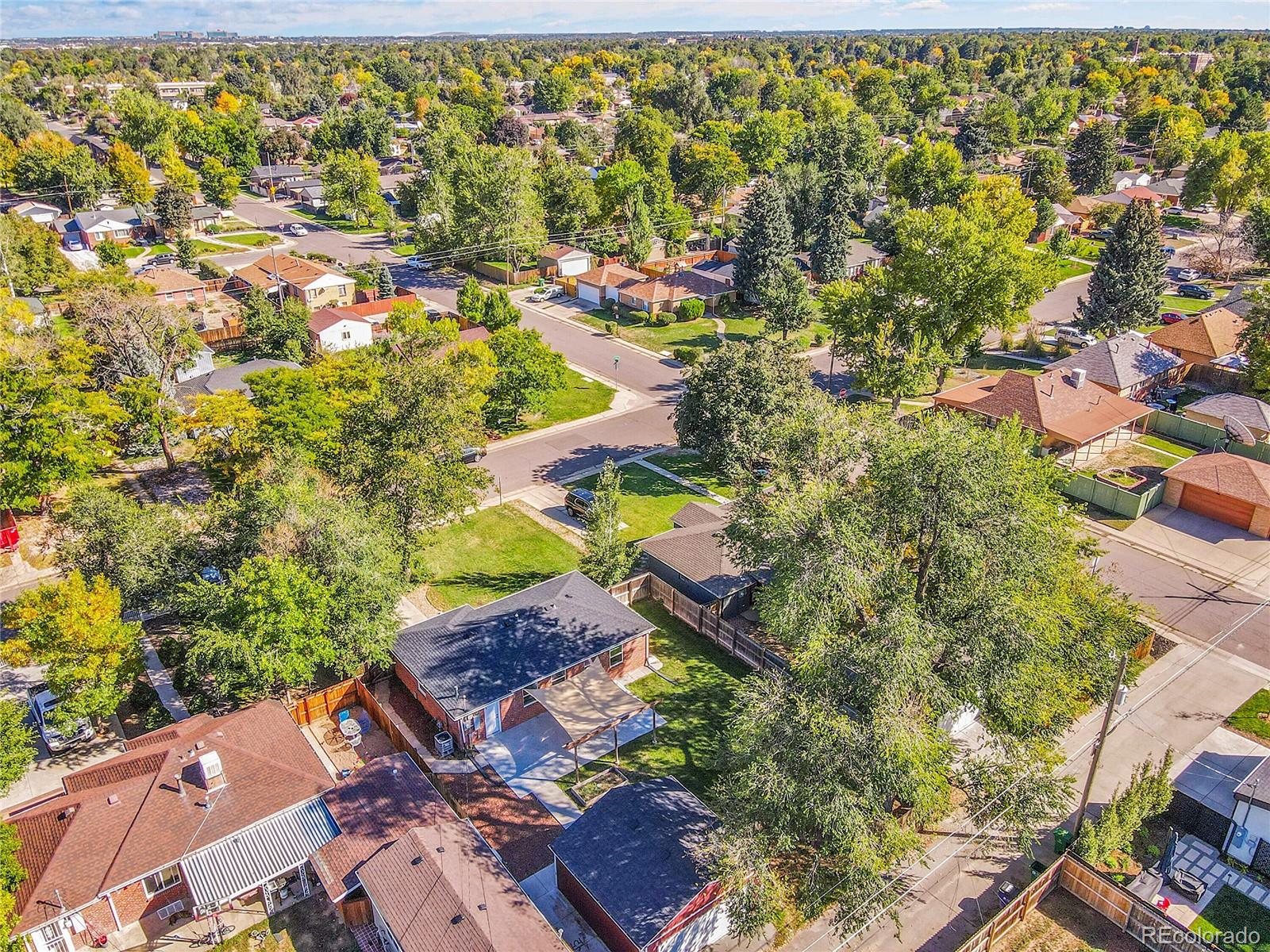 3011 Grape Street Denver, CO 80207 - Photo 35 of 42 an aerial view of residential houses with outdoor space