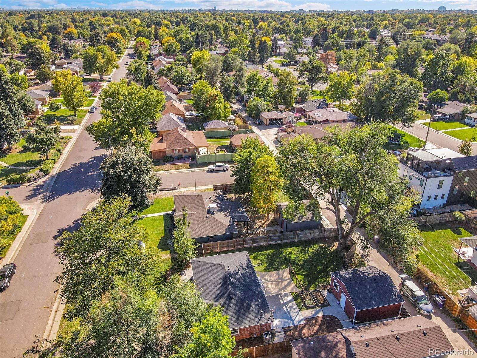 3011 Grape Street Denver, CO 80207 - Photo 36 of 42 an aerial view of residential houses with outdoor space and swimming pool