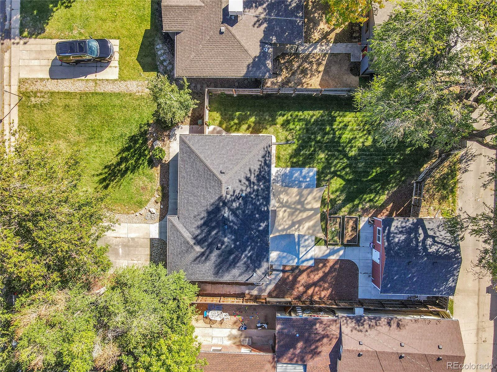 3011 Grape Street Denver, CO 80207 - Photo 41 of 42 an aerial view of a house with a yard