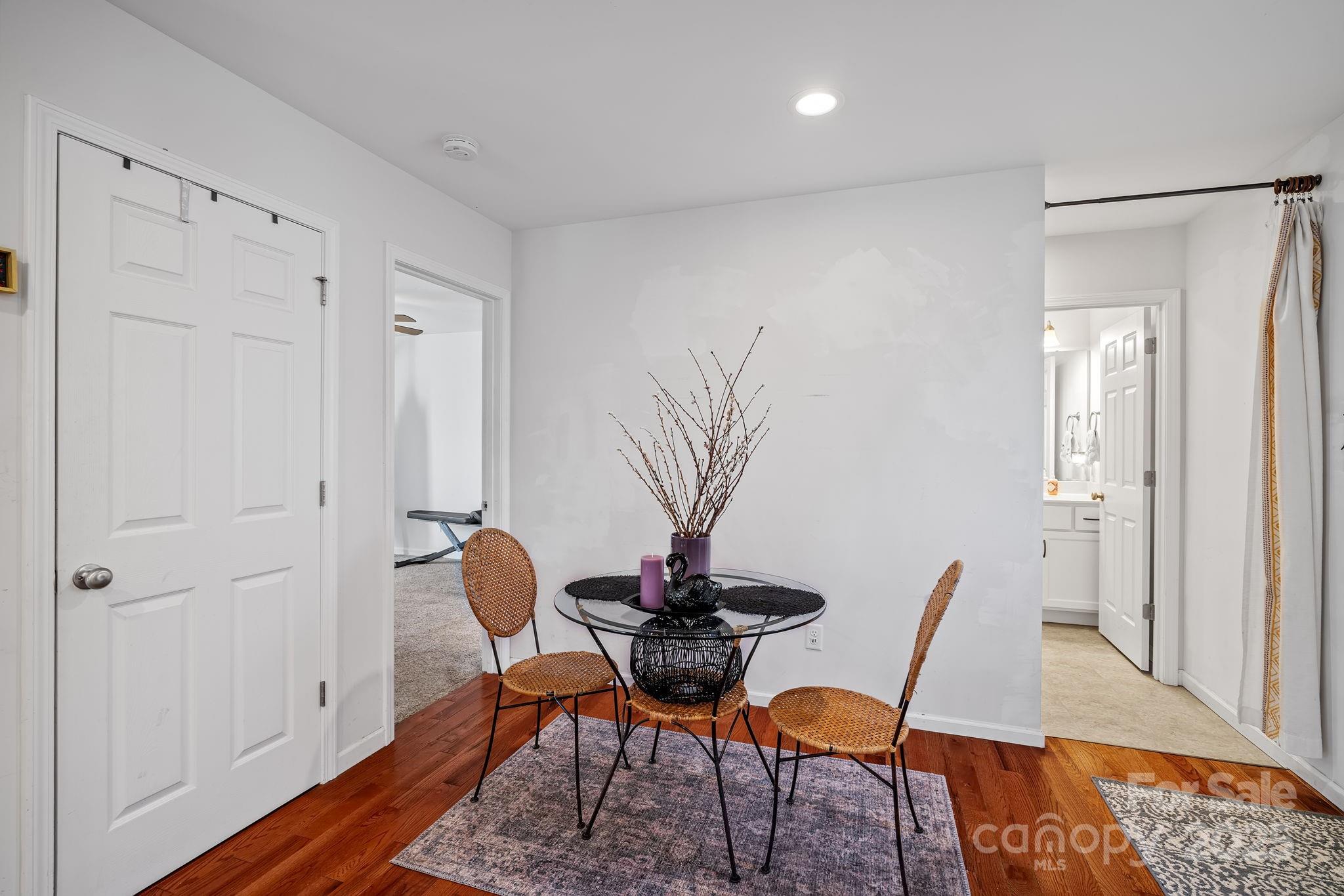 28 Yarrow Meadow Road Weaverville, NC 28787 - Photo 12 of 29 a view of a dining room with furniture and wooden floor