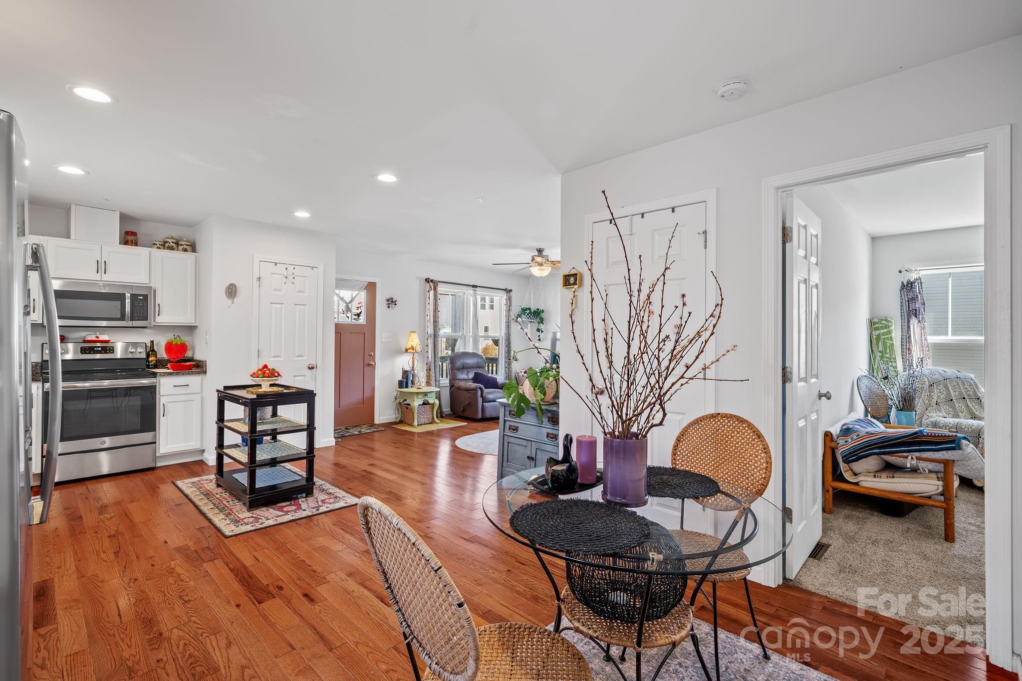 28 Yarrow Meadow Road Weaverville, NC 28787 - Photo 13 of 29 a living room with furniture and kitchen view