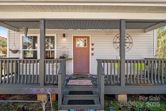 a front view of a house with a porch