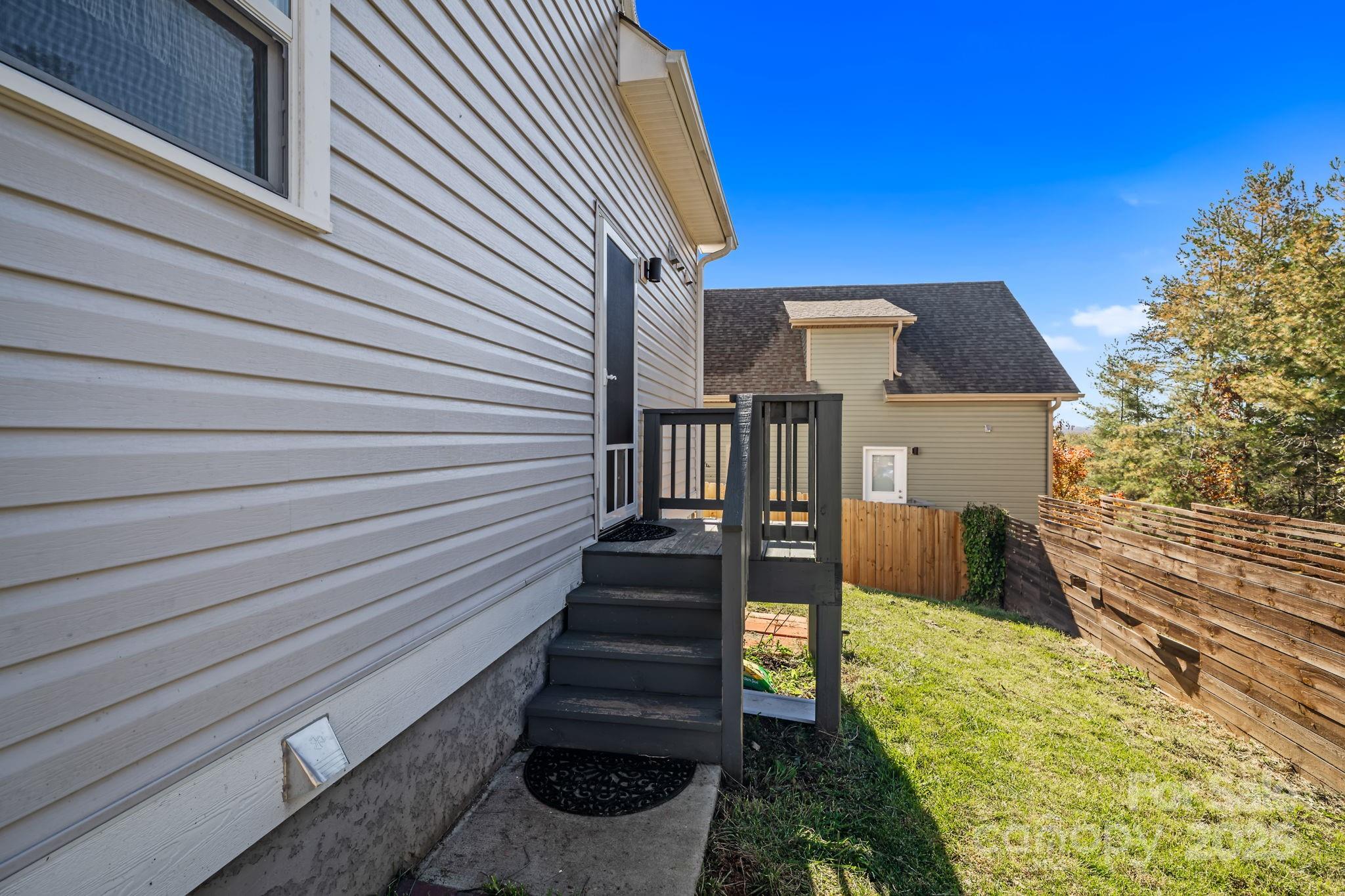 28 Yarrow Meadow Road Weaverville, NC 28787 - Photo 27 of 29 a view of a house with a yard