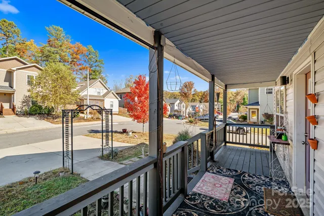 a view of a porch with wooden floor