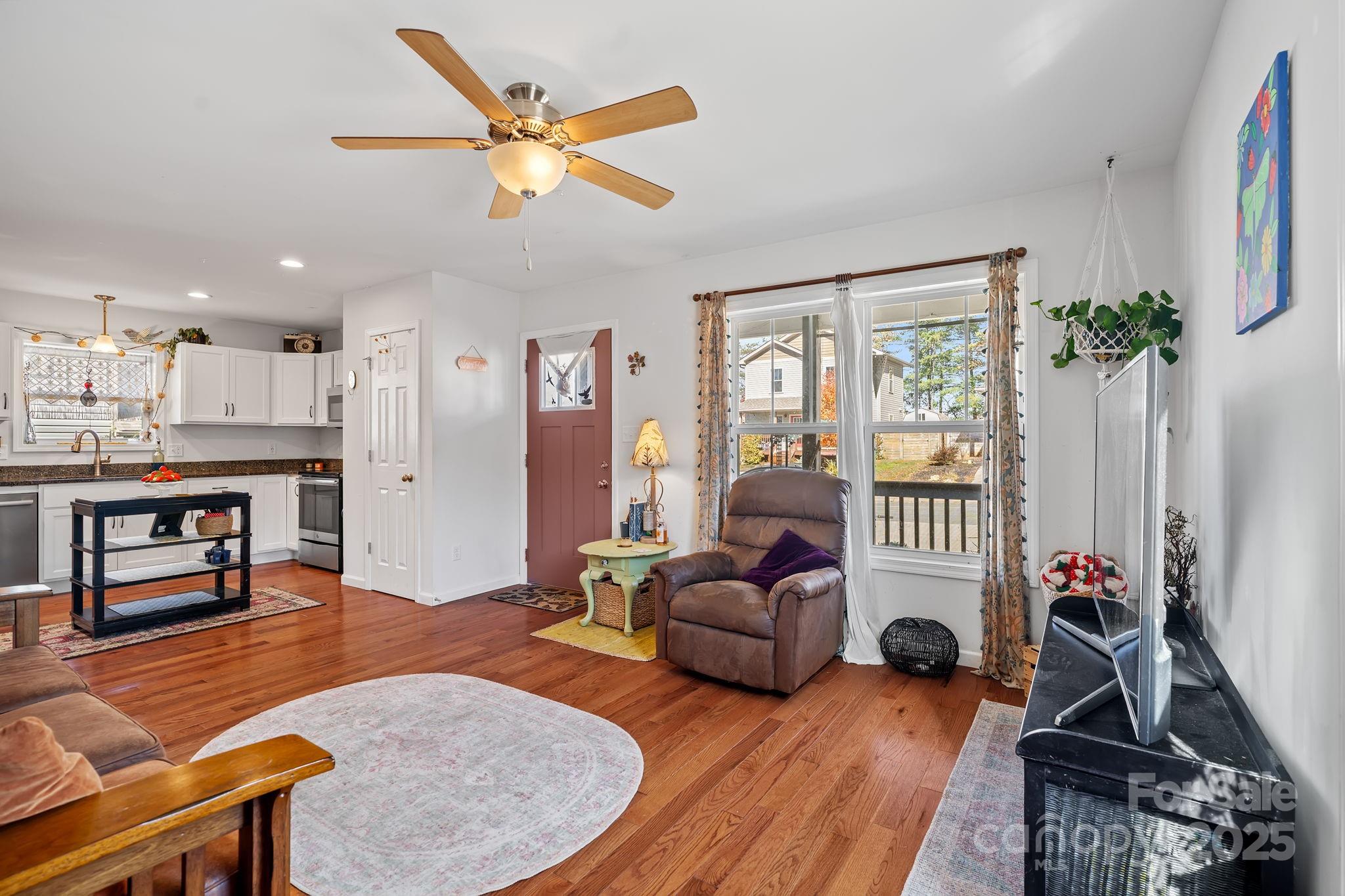 28 Yarrow Meadow Road Weaverville, NC 28787 - Photo 5 of 29 a living room with furniture and a large window