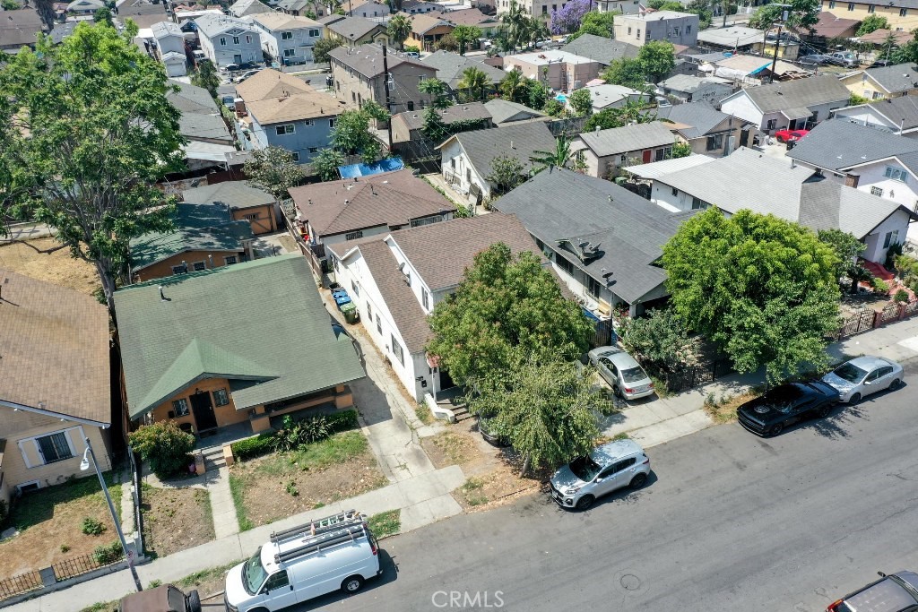 138 West 60th Street Los Angeles, CA 90003 - Photo 5 of 5 an aerial view of multiple houses with yard