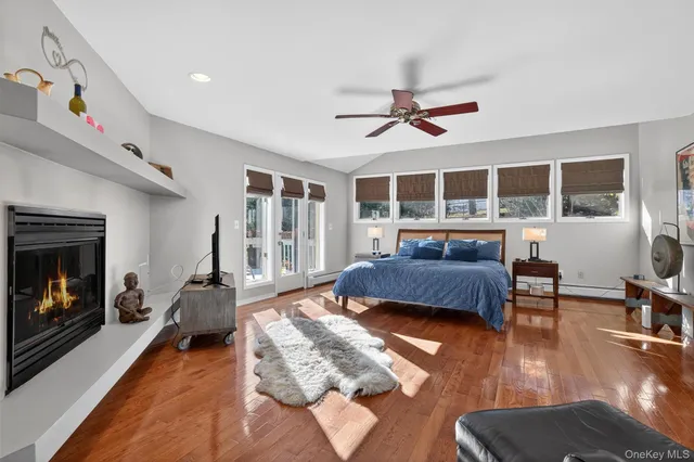 a living room with a couch and a large window