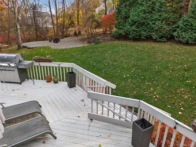 an aerial view of a house with garden space and sitting space