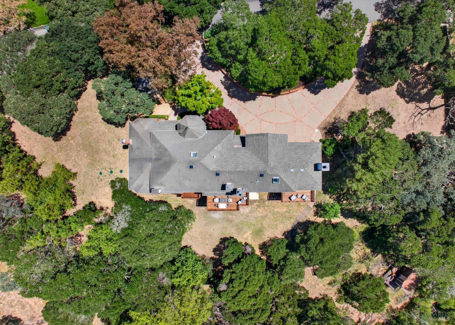 10 Lockton Lane Novato, CA 94945 - Photo 67 of 68 Overhead view of the residence and driveway, showing the home’s scale, privacy, and 1.88-acre setting.