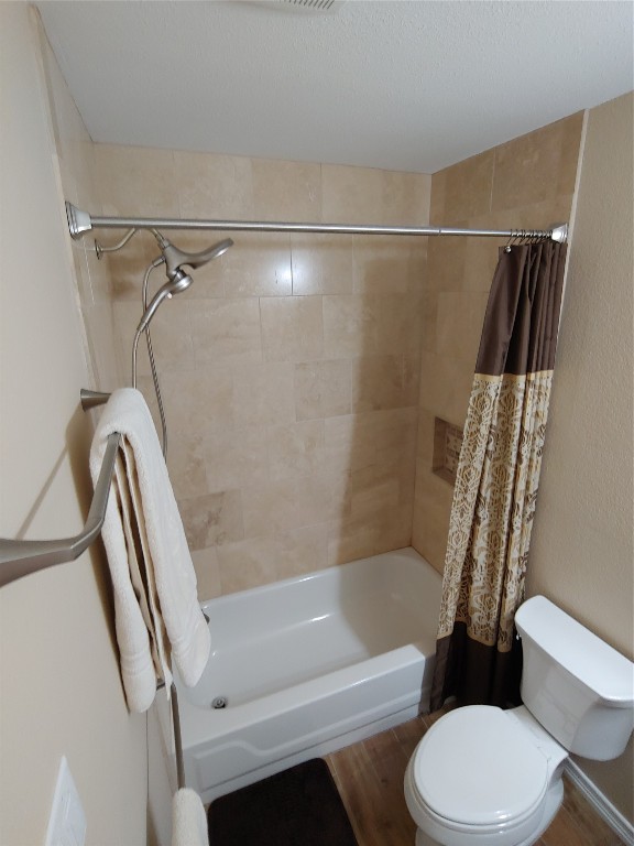 8124 Tockington Way Austin, TX 78748 - Photo 22 of 28 a bathroom with a toilet and a shower